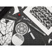 artPOP! Detail Knife - Grey, on cutting mat with cutout paper shapes