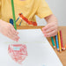 artPOP! Kids Drawing Pad - 9" x 12" (child using colored pencils to draw a house)