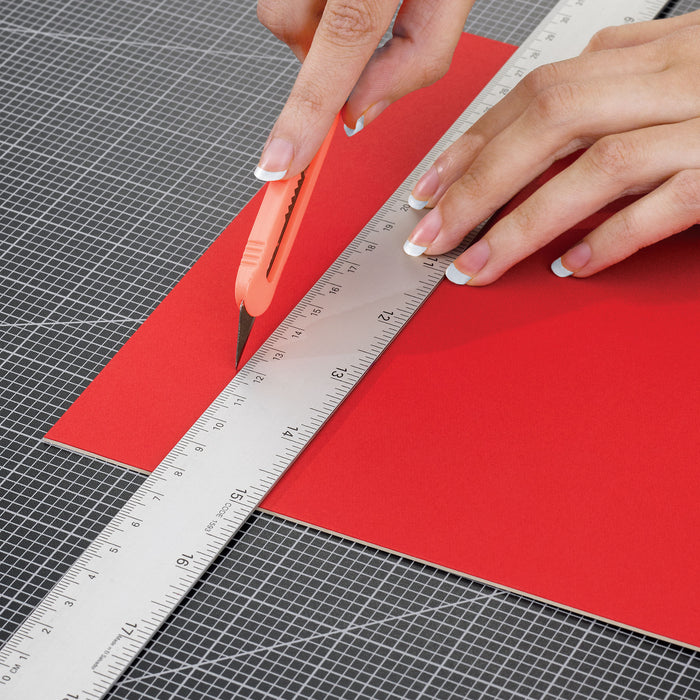 artPOP! Self-Healing Cutting Mat - 9" x 12" (Person cutting paper on cutting mat)