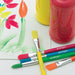 artPOP! Kids Rainbow Brush Set (Brushes laying on table with flower painting)